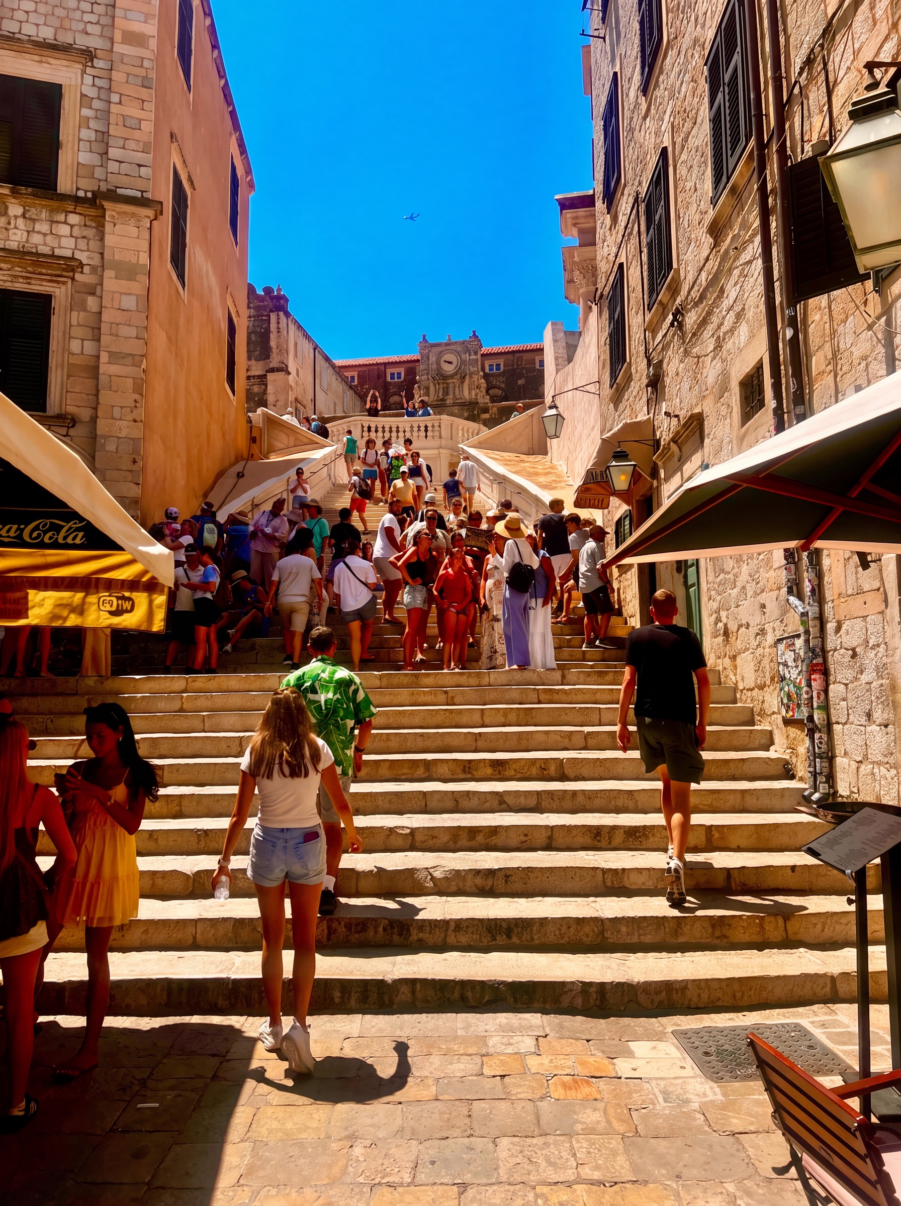 Travelers filling the Jesuit Steps between Dubrovnik's stone buildings